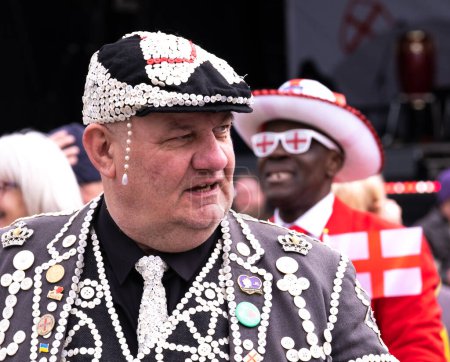 Photo for Trafalgar Square, London, UK. 24th April 2024. Terry Scott the Pearly King of Highgate, enjoying the festivities at the Saint George's Day celebration in Trafalgar Square, London, UK. - Royalty Free Image