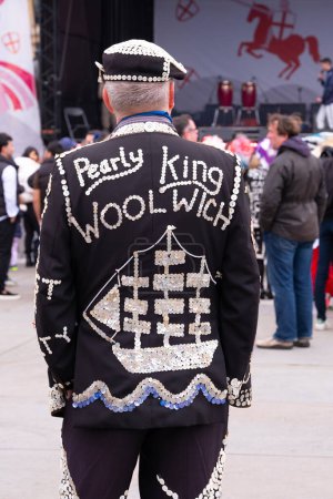 Photo for Trafalgar Square, London, UK. 24th April 2024. Clive Bennett the Pearly King of Woolwich, enjoying the festivities at the Saint George's Day celebration held in Trafalgar Square, London. - Royalty Free Image