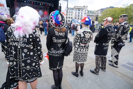 Photo for Trafalgar Square, London, UK. 24th April 2024. Pearly Kings and Queens standing in a row, enjoying the festivities at the Saint George's Day celebration held in Trafalgar Square, London. - Royalty Free Image