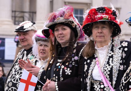 Photo for Trafalgar Square, London, UK. 24th April 2024. Pearly Queens and King enjoying the festivities at the Saint George's Day celebration held in Trafalgar Square, London. - Royalty Free Image