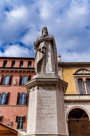 Photo for Statue of Dante Alighieri in Piazza delle Erbe, Verona. Traduction: "To Dante and his first home from the whole Italy. 14th May, 1865" - Royalty Free Image