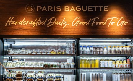 Photo for NEW YORK - FEBRUARY, 2020: Paris Baguette Boulangerie sign inside a store in Manhattan. Paris Baguette, a popular bakery caf franchise brand in South Korea. - Royalty Free Image