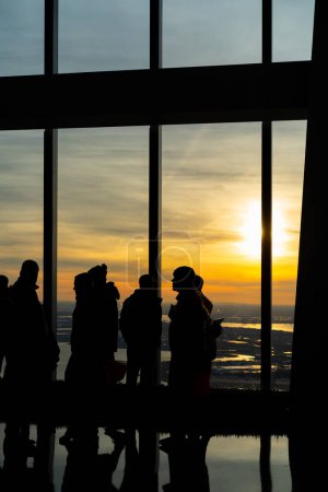 Photo for NEW YORK - FEBRUARY, 2020: One World Observatory deck with people silhouette on the One World Trade Center (Freedom Tower) the tallest structure in New York City. - Royalty Free Image