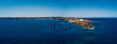 Photo for Panoramic aerial view of Favritx Lighthouse. Menorca, one of the Balearic Islands located in the Mediterranean Sea belonging to Spain. - Royalty Free Image
