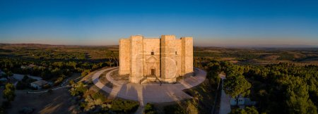 Photo for Aerial panoramic view of Castel del Monte, the famous castle built in an octagonal shape by the Holy Roman Emperor Frederick II in the 13th century in Apulia, Italy. World Heritage Site since 1996. - Royalty Free Image