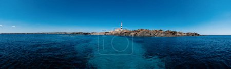 Photo for Favritx Lighthouse panoramic view. Menorca, one of the Balearic Islands located in the Mediterranean Sea belonging to Spain. High resolution image. - Royalty Free Image