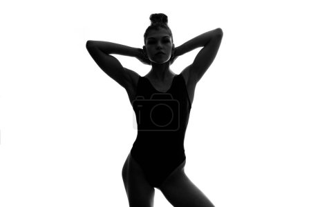 Photo for Sexy woman silhouette portrait with black underwear isolated against white background. Studio portrait. Black and white. - Royalty Free Image