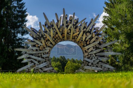Photo for VALSUGANA, TRENTO, ITALY - AUGUST 2020: Handmade artistic wooden sculpture by Jaehyo Lee inside the Artesella museum park. - Royalty Free Image