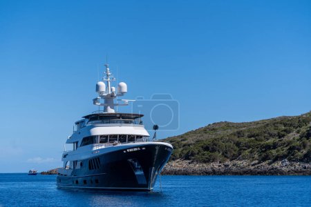 Photo for GIANNUTRI ISLAND, ITALY - JULY 2021: Luxury yacht moored on the coast of Giannutri. - Royalty Free Image
