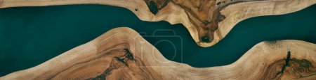 Photo for Green or blue epoxy resin panel with walnut, texture for design, source, template - Royalty Free Image
