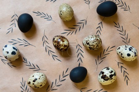Conceptual easter table setting with painted eggs as a background