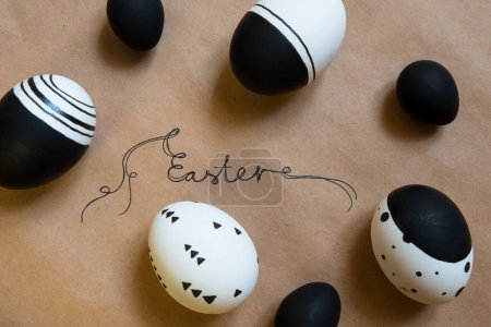 Conceptual easter table setting with painted eggs as a background