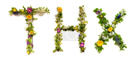 Photo for Blooming Flower Letters Building English Word THX. Summer And Spring Season Blossoms And Flower Lei. - Royalty Free Image