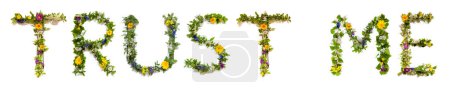 Téléchargez les photos : Blooming Flower Letters Building Texte anglais Trust Me. Été et printemps saison fleurs et fleur Lei. - en image libre de droit