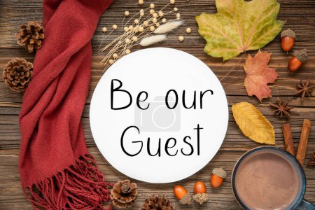 Photo for Autumn Decoration, Flat Lay With Colorful Maple Leaves, Cozy Atmosphere and Label With Text Be Our Guest - Royalty Free Image