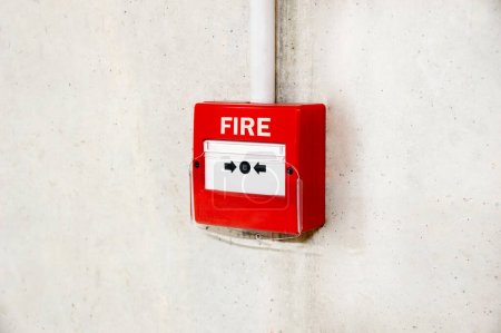 Photo for Fire alarm switch on the factory wall. - Royalty Free Image