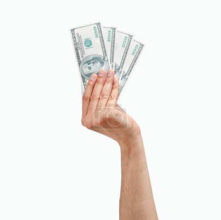 Cropped shot of an unrecognizable man hand holding paper currency on a white isolated background