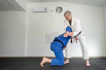 Foto de Brasileño jiu jitsu bjj concepto entrenamiento artes marciales combate deporte - Imagen libre de derechos