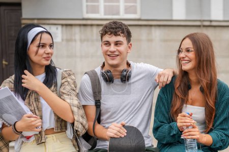 Photo for Group of teenage students gen z in front of school university male and female friends caucasian man and woman teenagers in front of campus or wait for the class back to school concept - Royalty Free Image