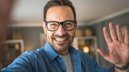 Photo for One man adult portrait of caucasian male with beard and eyeglasses stand at home happy smile copy space self portrait selfie - Royalty Free Image