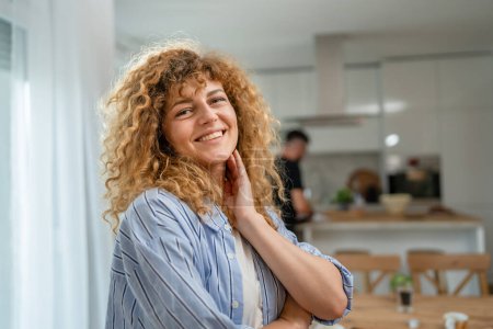 Photo for Portrait of one adult caucasian woman at home happy smile curly hair - Royalty Free Image