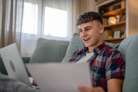 Photo for Young caucasian man teenager student study at home - Royalty Free Image