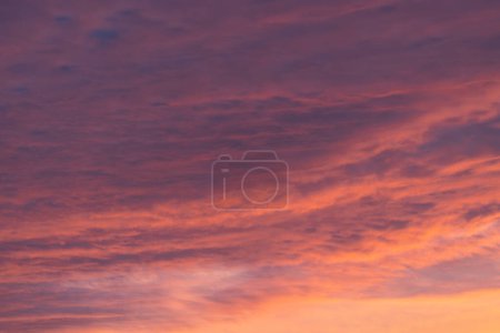 Low angle view to evening sky with dramatic clouds