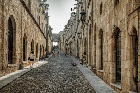 Photo for RHODES, GREECE - JULY 4, 2022: Hictorical Street of the Knights called Ippoton with stone houses in Old town of Rhodes city in Rhodes island, Greece - Royalty Free Image