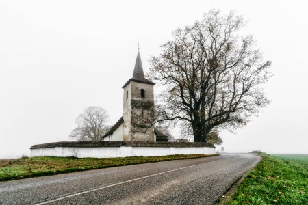 Photo for Old gothic church in Ludrova village near Ruzomberok, Slovakia - Royalty Free Image