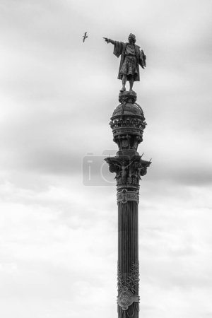 Christhoper Columbus monument in La Rambla. Barcelona, Spain showing on seagull. Black and white photo.