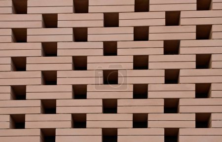 Photo for Wall with rectangular shapes bricks on building facade on Seville, Spain. - Royalty Free Image