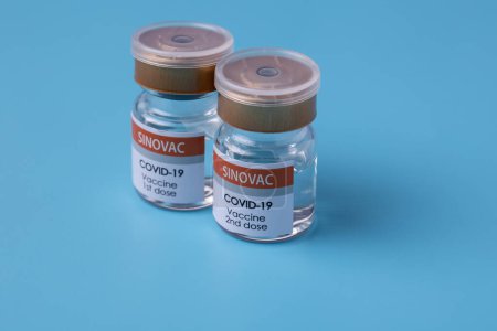 Photo for Kota Kinabalu,Sabah, Malaysia-May 30, 2021 : Close-up of COVID-19 coronavirus vaccine Bottle of Sinovac Covid-19 vaccine with Sinovac trademark - Royalty Free Image