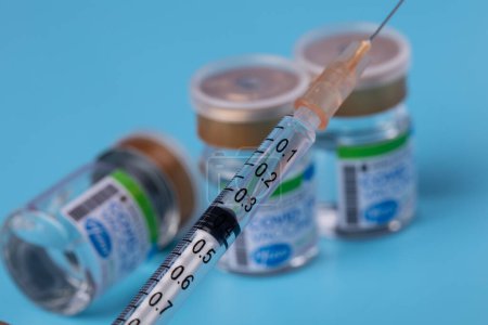 Photo for Kota Kinabalu, Sabah, Malaysia-May 30, 2021- Close-up of COVID-19 coronavirus vaccine Bottle of Pfizer-BioNTech Covid-19 vaccine with Pfizer trademark - Royalty Free Image