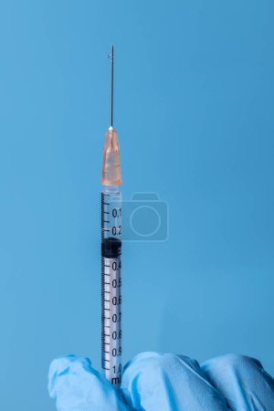 Photo for Close-up of injection solution and syringe of Corona virus vaccine. Copy space - Royalty Free Image