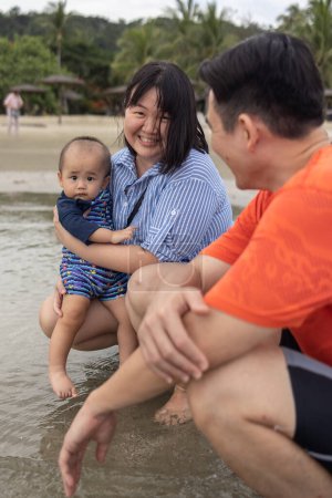 Photo for Family with little son on the beach. - Royalty Free Image