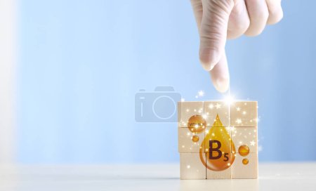 Photo for Wood blocks with Vitamin B 5 on it. symbol of the need for vitamins - Royalty Free Image