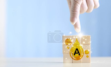 Photo for Wood blocks with Vitamin A on it. symbol of the need for vitamins - Royalty Free Image