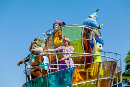 Photo for Paris, France - June 02, 2023: Show performed in the morning in the central square on the occasion of the thirtieth anniversary. Characters and princesses on the parade float. - Royalty Free Image