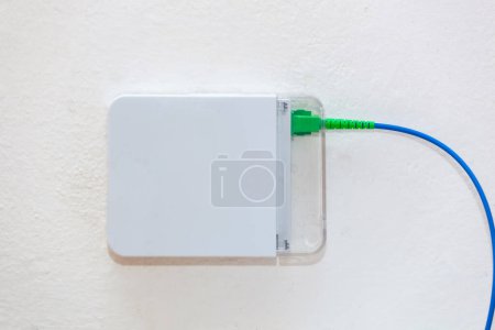 Photo for Optical socket for internet browsing with FTTH fiber. - Royalty Free Image