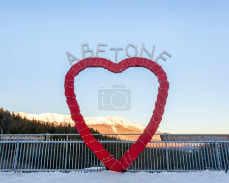 Photo for Abetone, Italy - December 19, 2023: famous mountain location in Tuscany. Red heart with the city name written on it. - Royalty Free Image