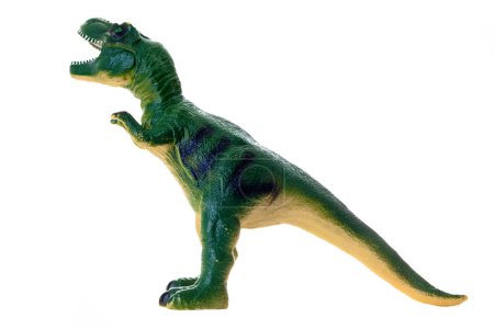 Foto de Vibrante réplica de juguete de un tiranosaurio rex, aislado sobre un fondo blanco. - Imagen libre de derechos