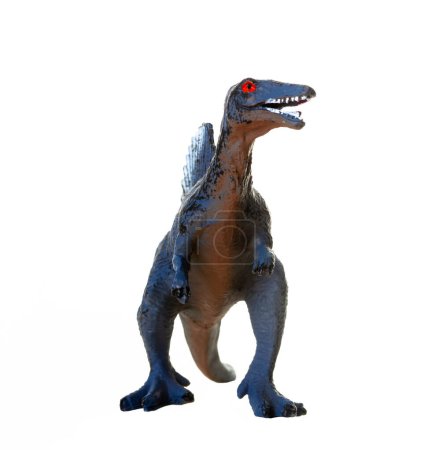 Foto de Modelo de juguete plástico detallado de un dinosaurio spinosaurus azul sobre un fondo blanco - Imagen libre de derechos
