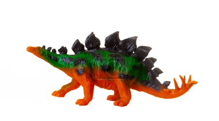 Téléchargez les photos : Modèle en plastique réaliste d'un dinosaure Stegosaurus sur fond blanc. - en image libre de droit