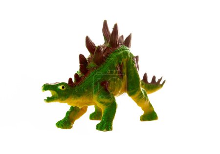 Téléchargez les photos : Modèle en plastique réaliste d'un dinosaure Stegosaurus sur fond blanc. - en image libre de droit