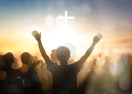 Silhouette worship team raising hands for thanks God at white cross background
