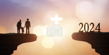 Photo for 2024 year worship concept ,Silhouette people looking for the cross on autumn sunrise background - Royalty Free Image
