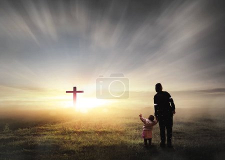 Photo for Silhouette people looking for the cross on autumn sunrise background - Royalty Free Image