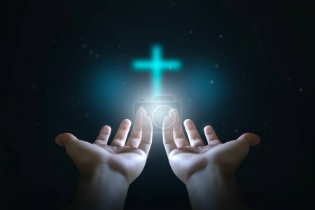 Photo for Easter concept, Open hands  holding a glowing cross , symbol of Christian faith. - Royalty Free Image