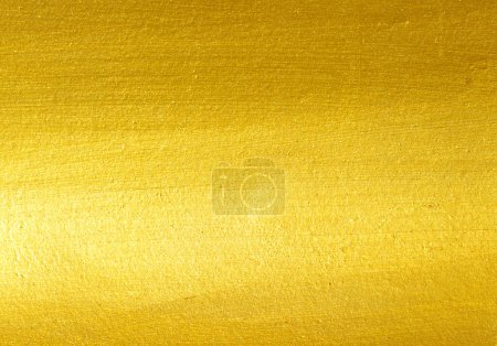 Foto de Fondo cepillado de metal dorado o textura de acero cepillado - Imagen libre de derechos