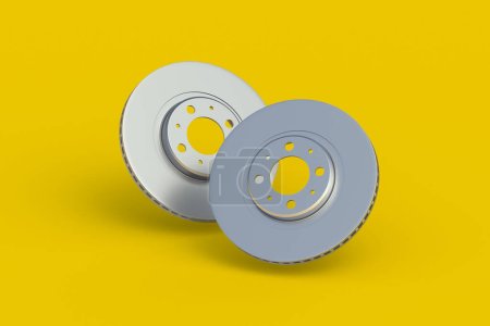 Falling brake disks on yellow background. Spare parts for car service. Automotive components. 3d render